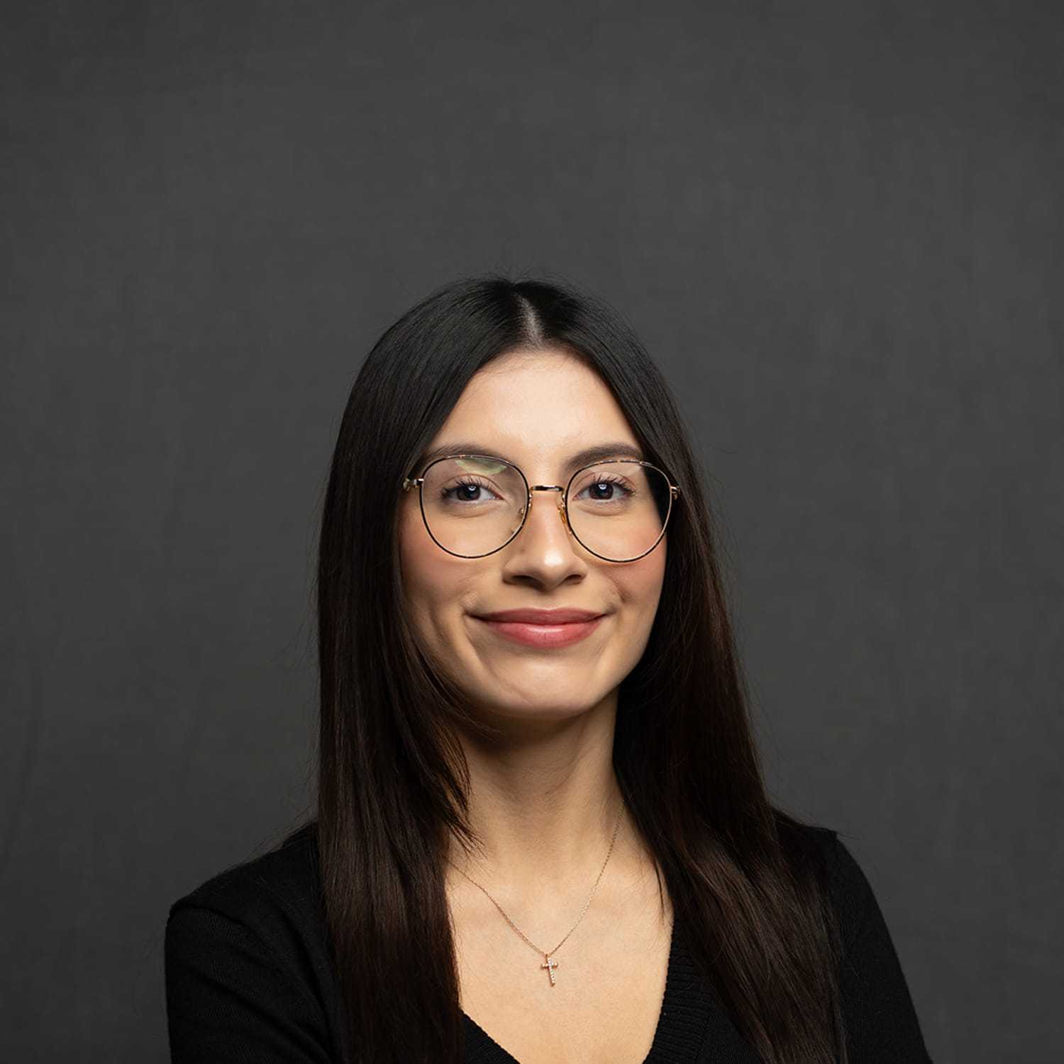Portrait of Erin, a professional stylist at Frank Gironda  Salons, showcasing their expertise and style.