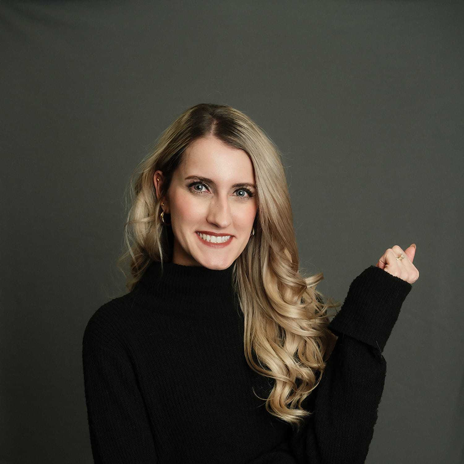 Portrait of Jessie, a professional stylist at Frank Gironda  Salons, showcasing their expertise and style.