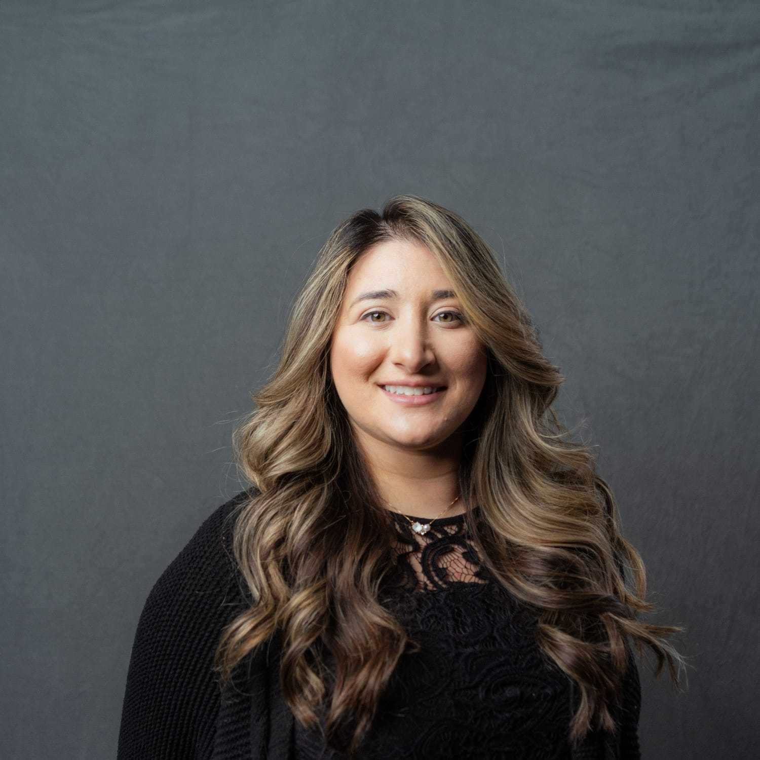 Portrait of Eliana, a professional stylist at Frank Gironda Salons, showcasing their expertise and style.