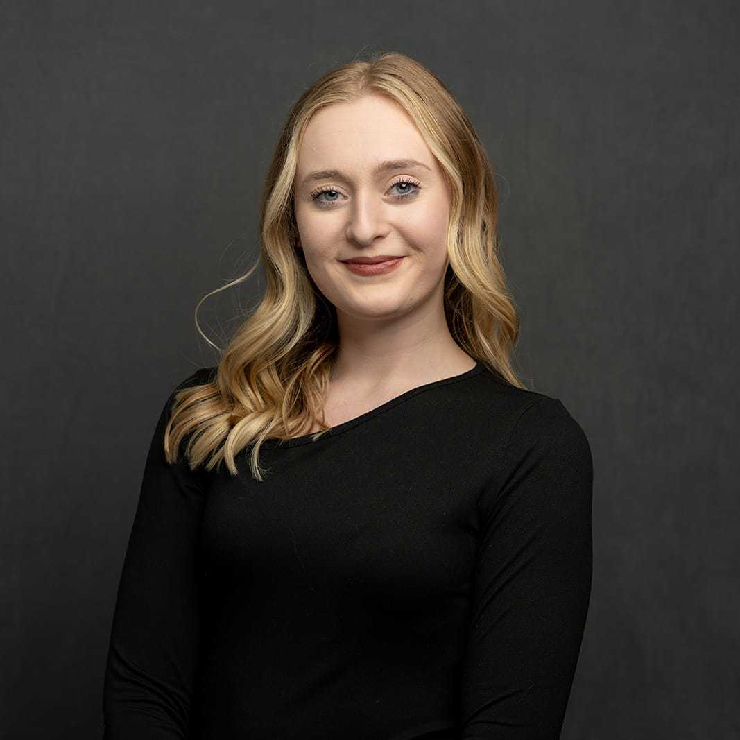 Portrait of Sydney, a professional stylist at Frank Gironda  Salons, showcasing their expertise and style.