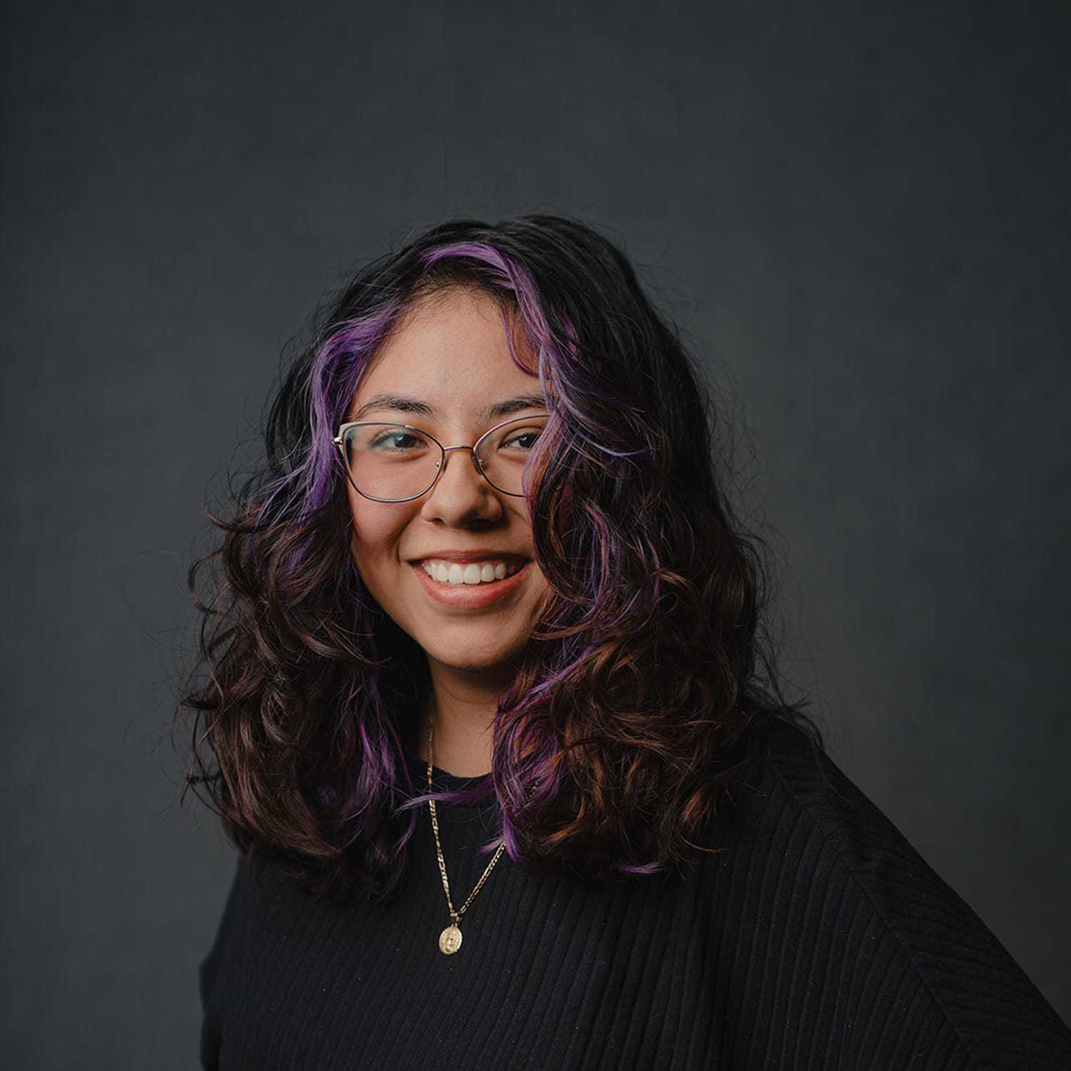 Portrait of Cynthia, a professional stylist at Frank Gironda Salons, showcasing their expertise and style.