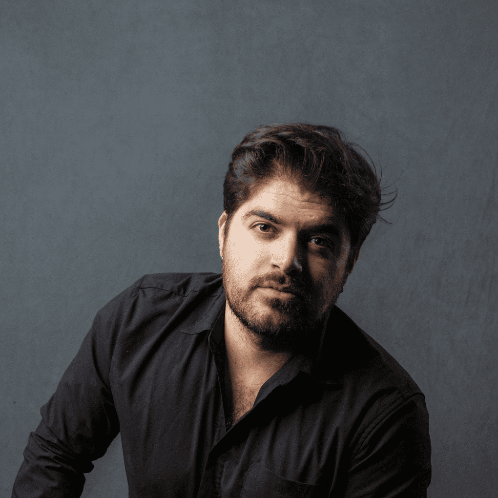 Portrait of Sean, a professional stylist at Frank Gironda  Salons, showcasing their expertise and style.