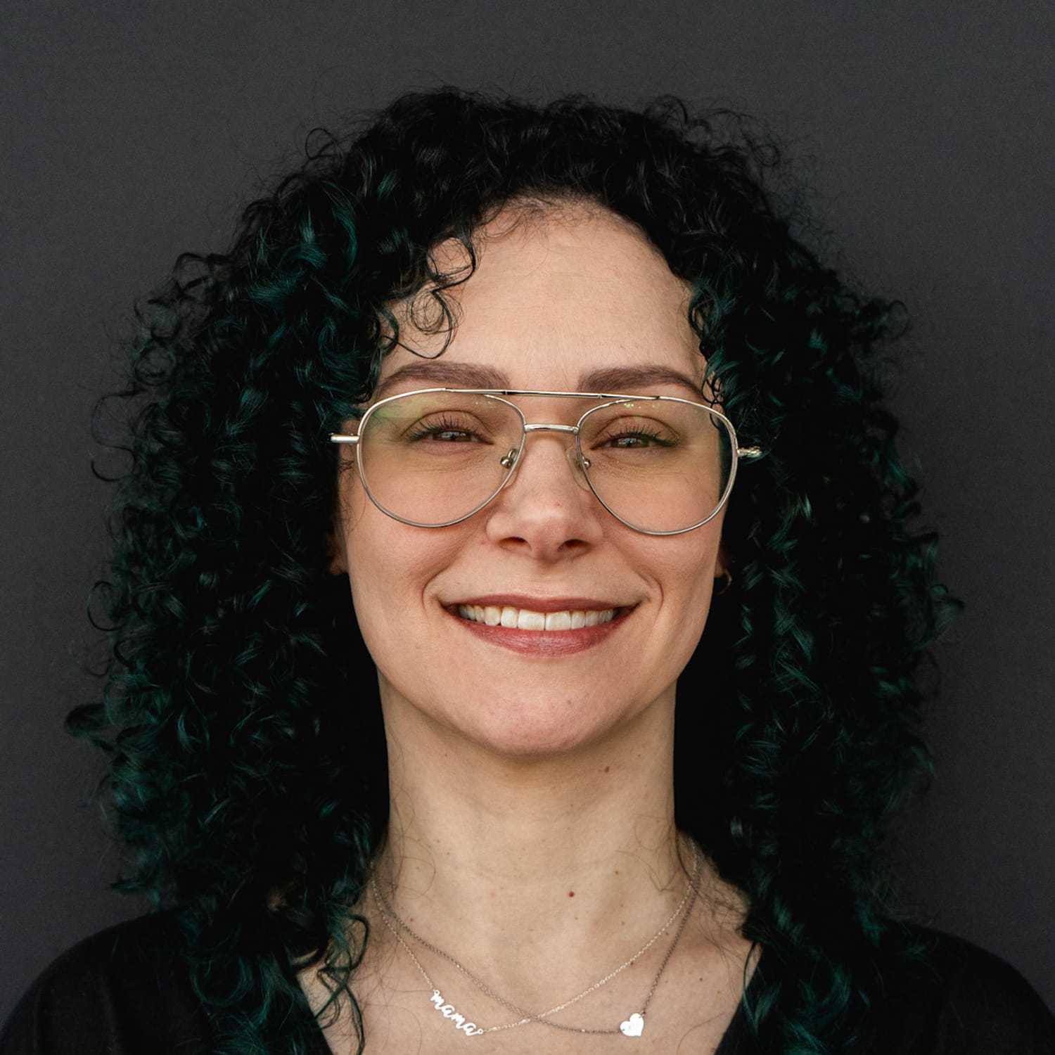 Portrait of Paige, a professional stylist at Frank Gironda Salons, showcasing their expertise and style.