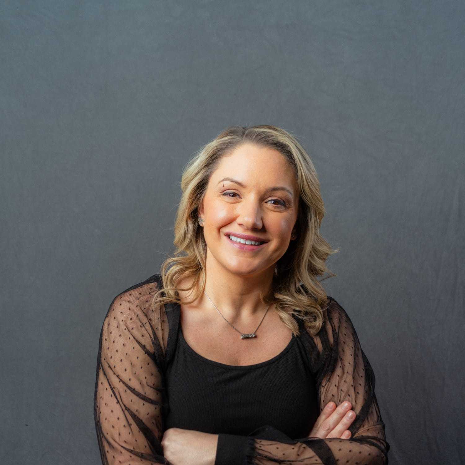 Portrait of Jess, a professional stylist at Frank Gironda  Salons, showcasing their expertise and style.