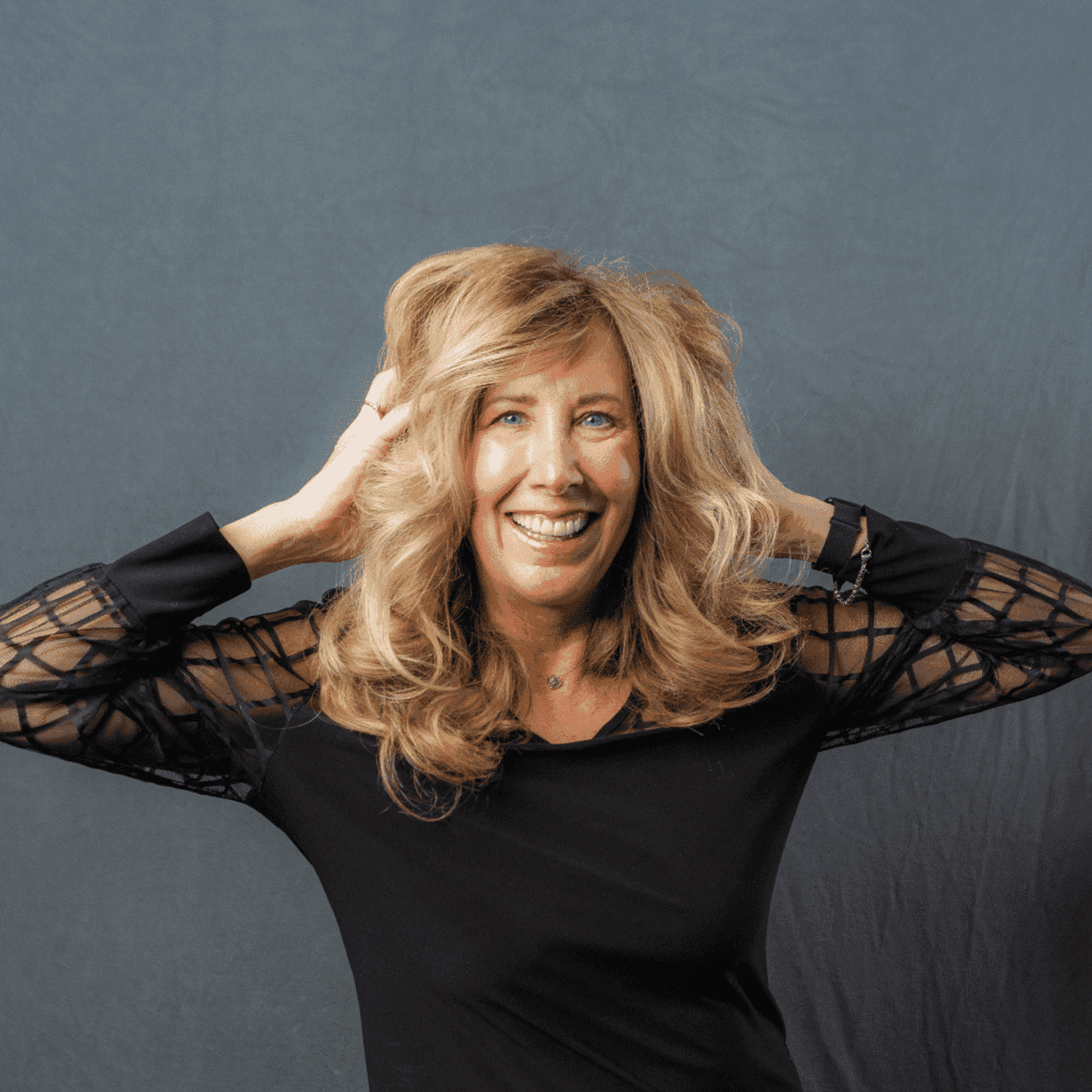 Portrait of Sheri, a professional stylist at Frank Gironda  Salons, showcasing their expertise and style.