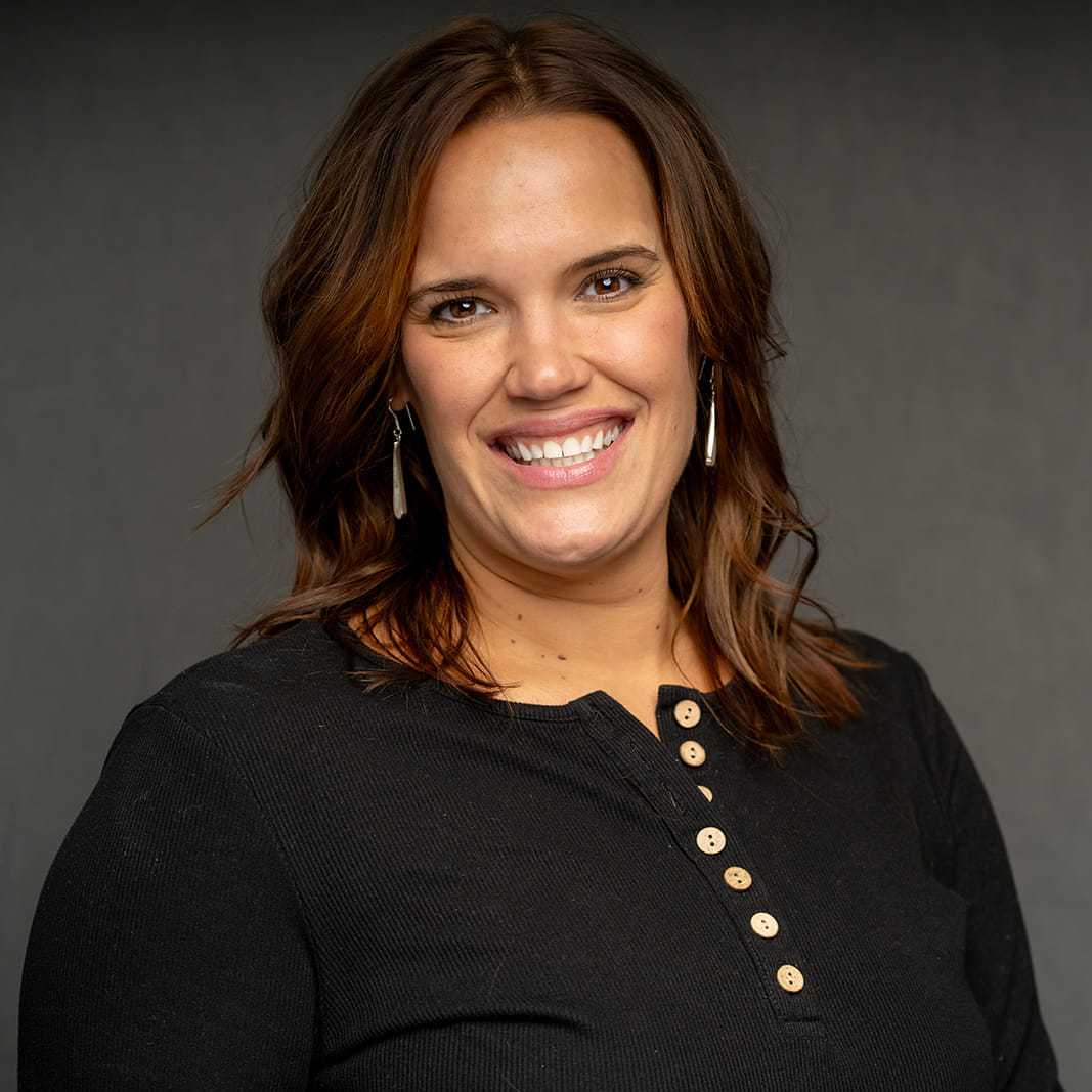 Portrait of Liz, a professional stylist at Frank Gironda  Salons, showcasing their expertise and style.