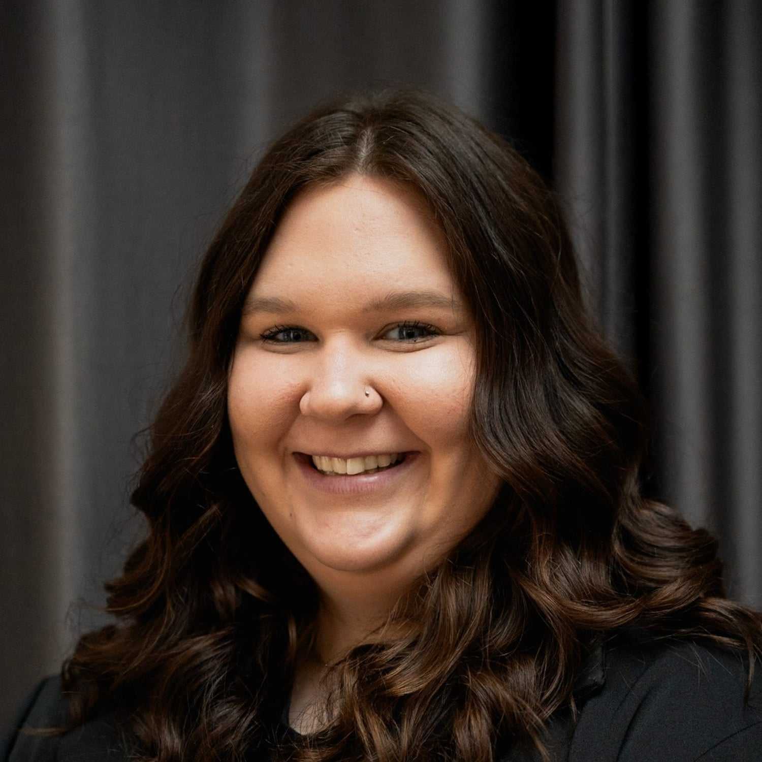 Portrait of Kaylee, a professional stylist at Frank Gironda  Salons, showcasing their expertise and style.