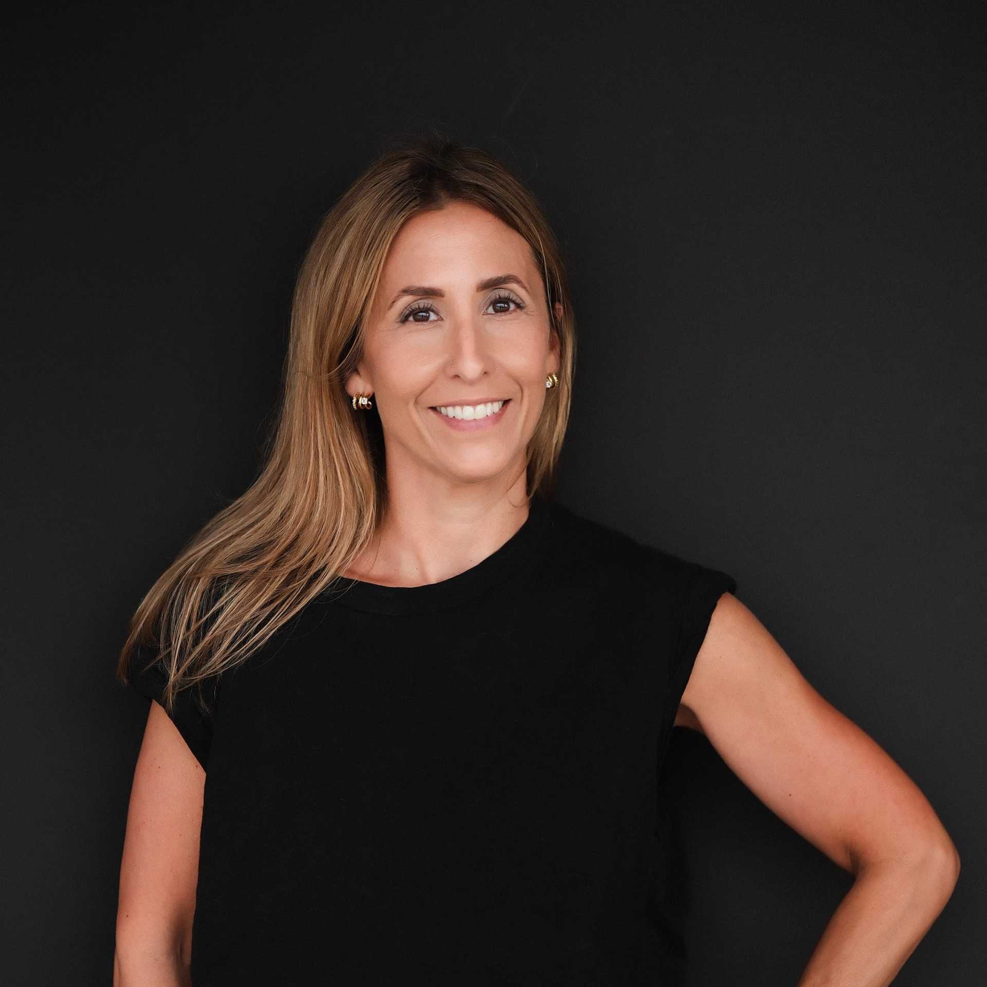 Portrait of Maria, a professional stylist at Frank Gironda  Salons, showcasing their expertise and style.