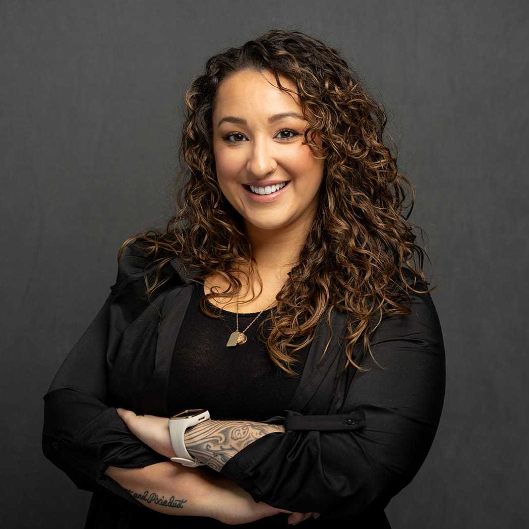 Portrait of Crystal, a professional stylist at Frank Gironda Salons, showcasing their expertise and style.
