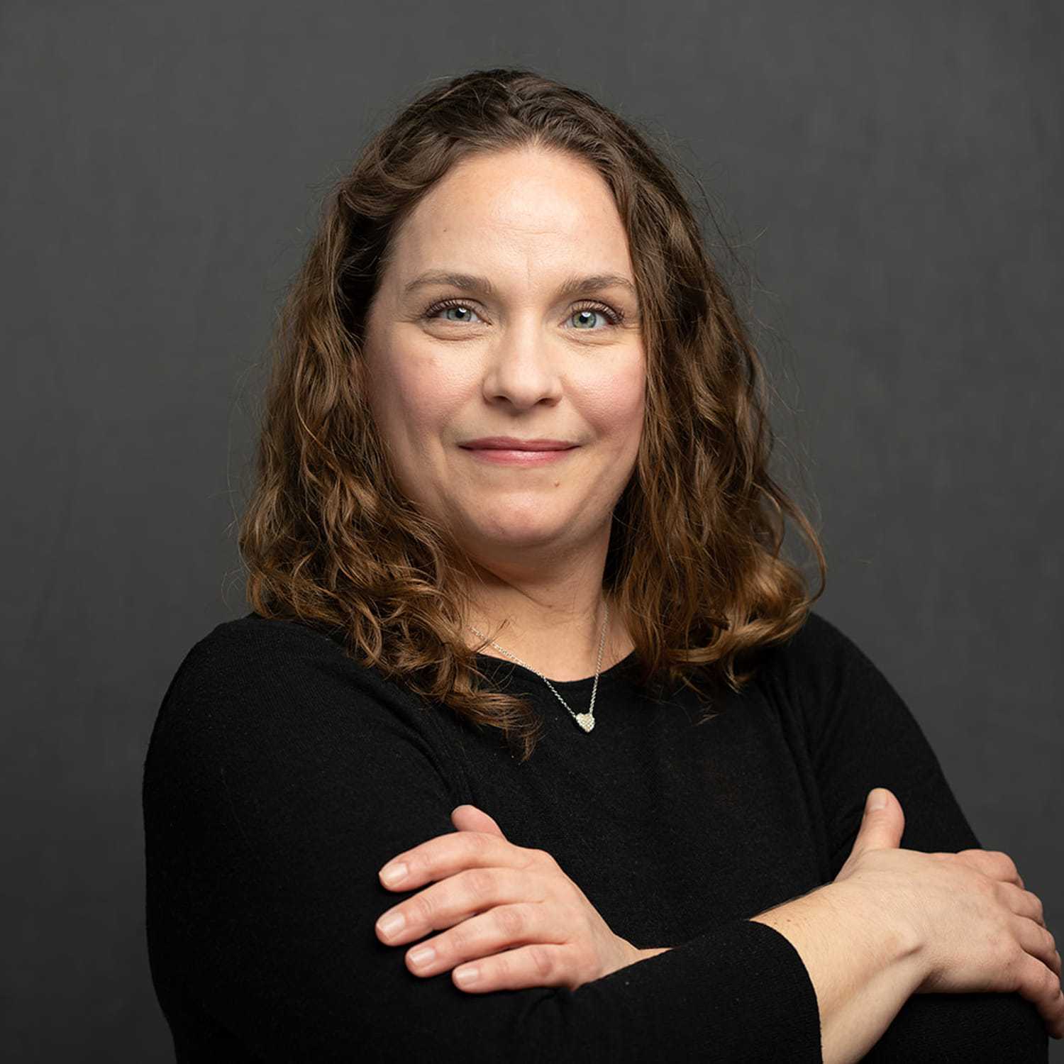 Portrait of Carrie, a professional stylist at Frank Gironda  Salons, showcasing their expertise and style.