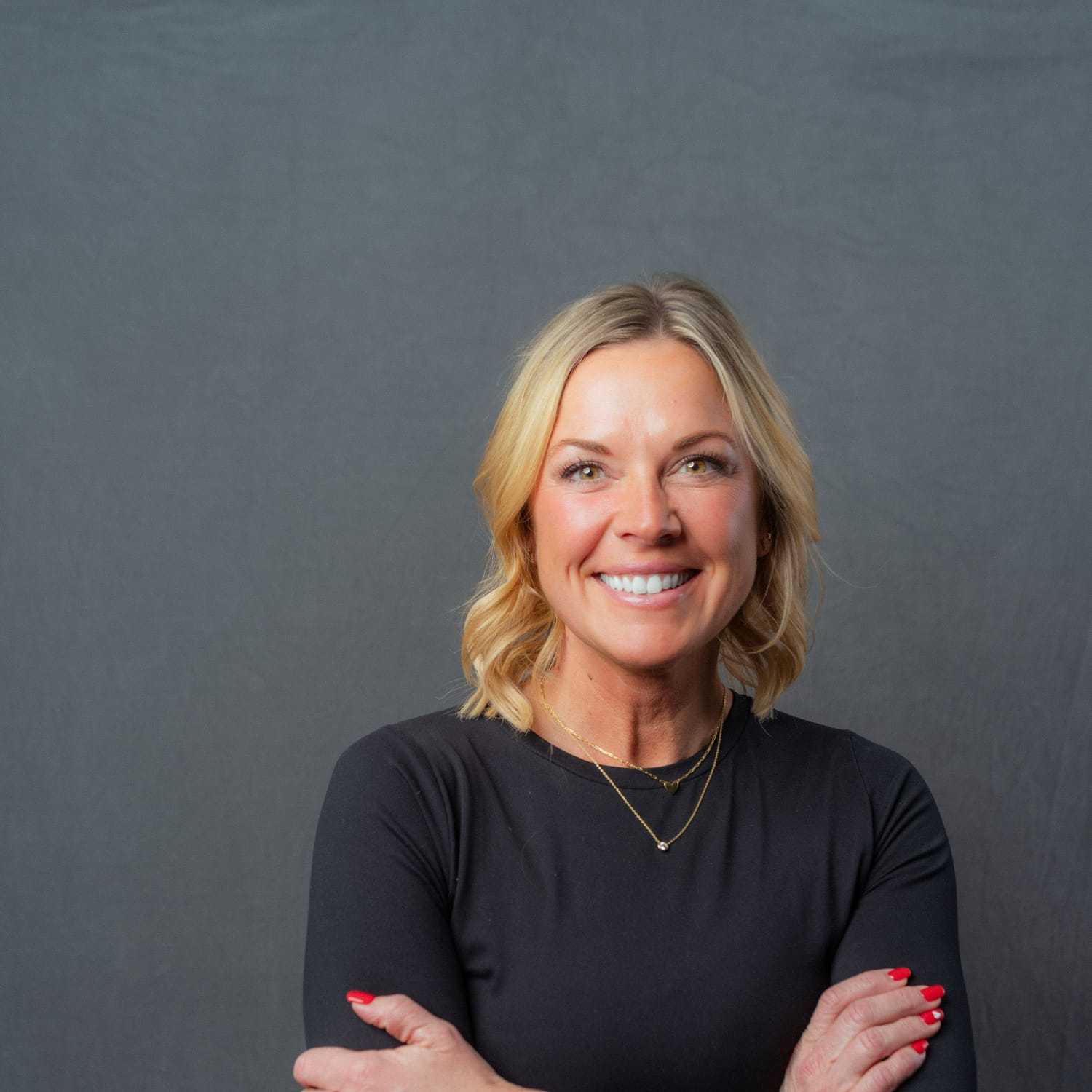 Portrait of Bella, a professional stylist at Frank Gironda  Salons, showcasing their expertise and style.