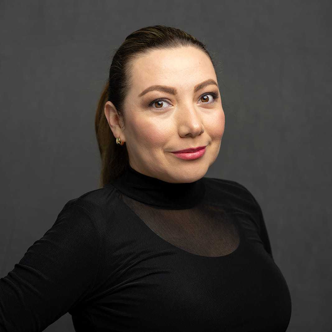 Portrait of Fernanda, a professional stylist at Frank Gironda Salons, showcasing their expertise and style.