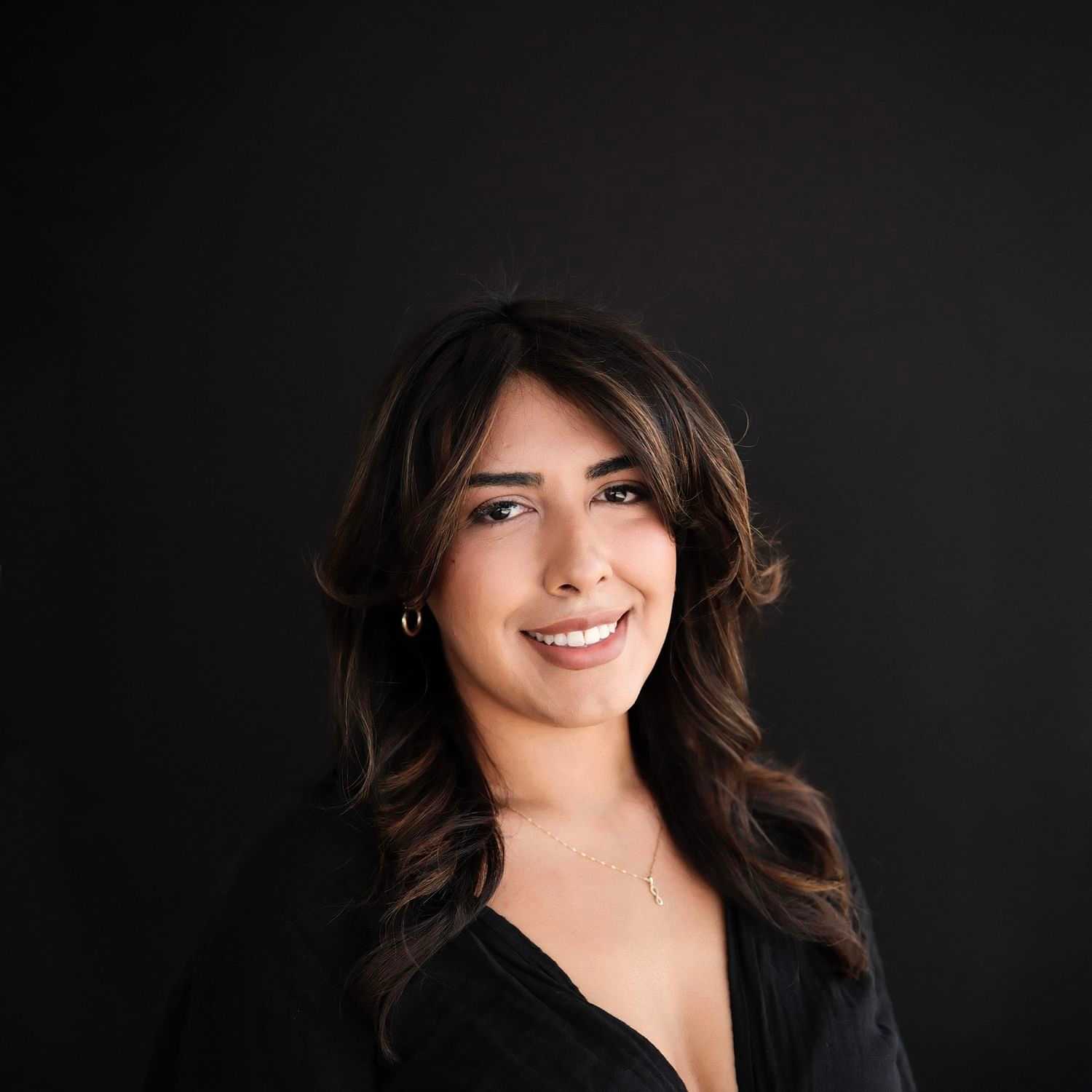 Portrait of Miranda, a professional stylist at Frank Gironda  Salons, showcasing their expertise and style.