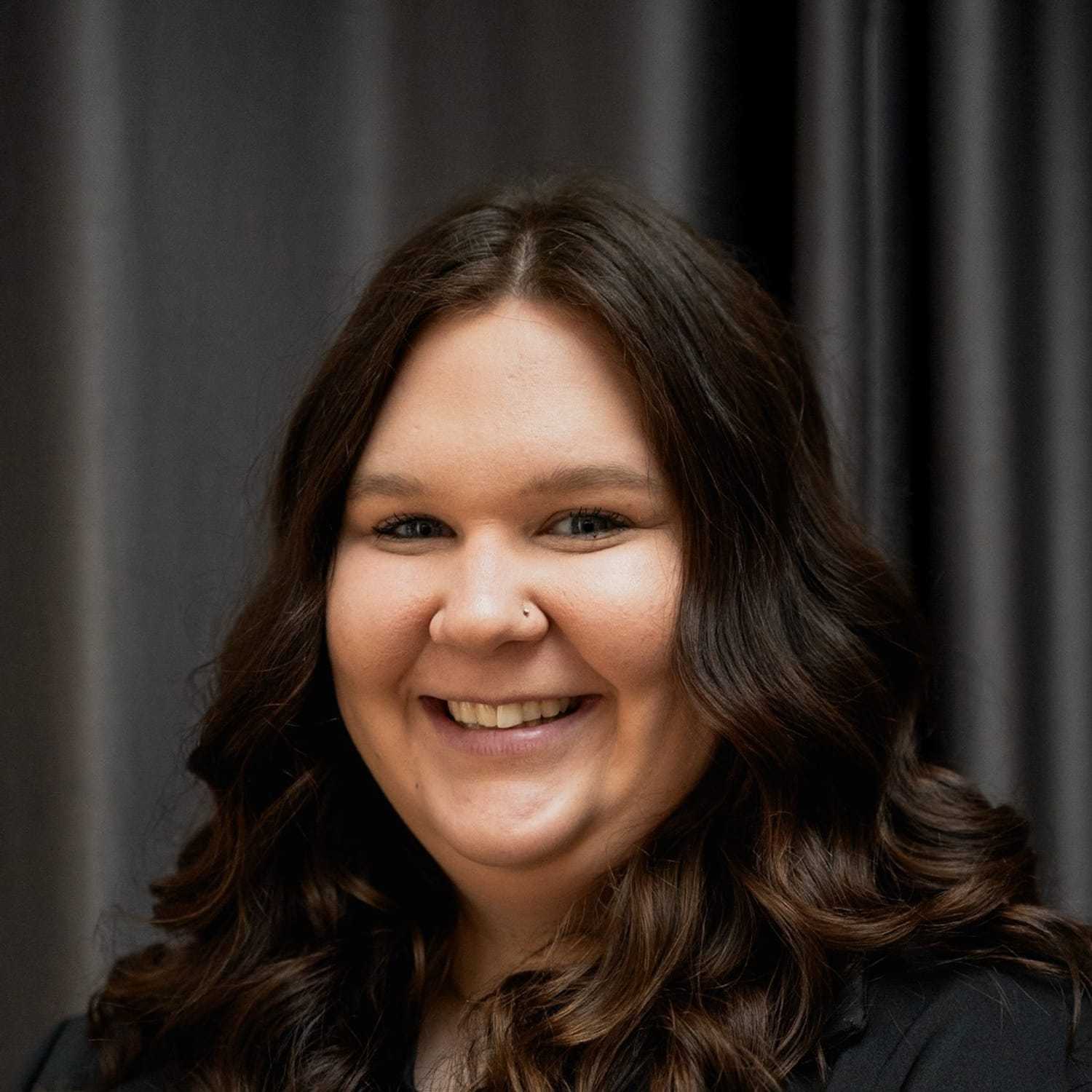 Portrait of Kaylee, a professional stylist at Frank Gironda  Salons, showcasing their expertise and style.