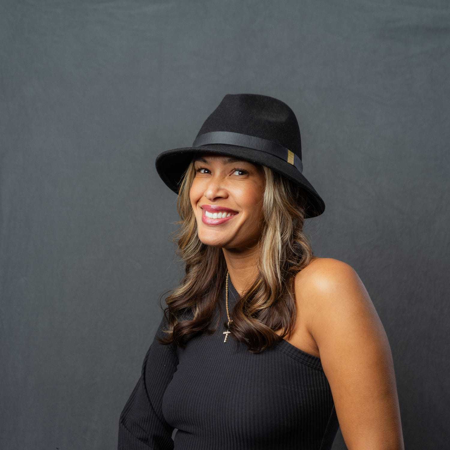 Portrait of Clarissa, a professional stylist at Frank Gironda  Salons, showcasing their expertise and style.