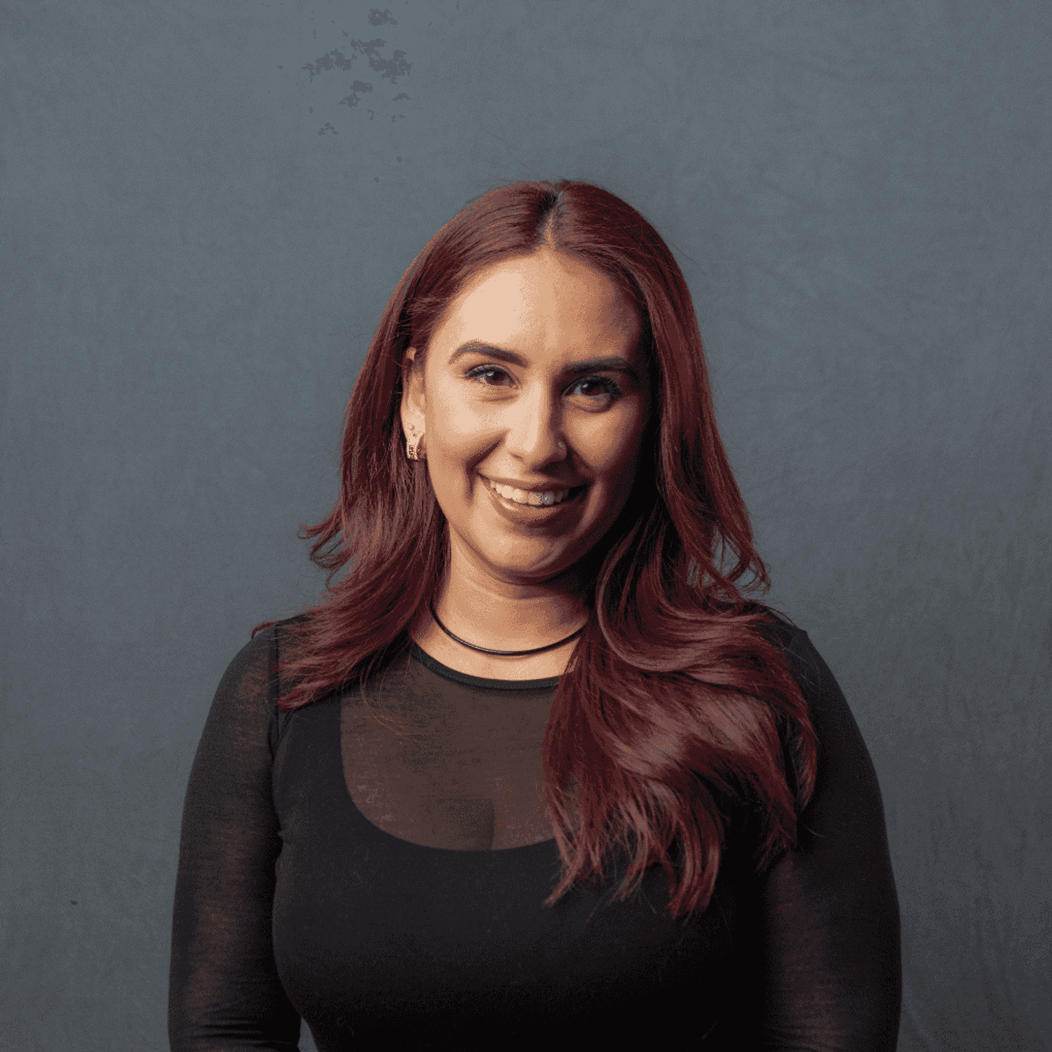 Portrait of Justine, a professional stylist at Frank Gironda Salons, showcasing their expertise and style.