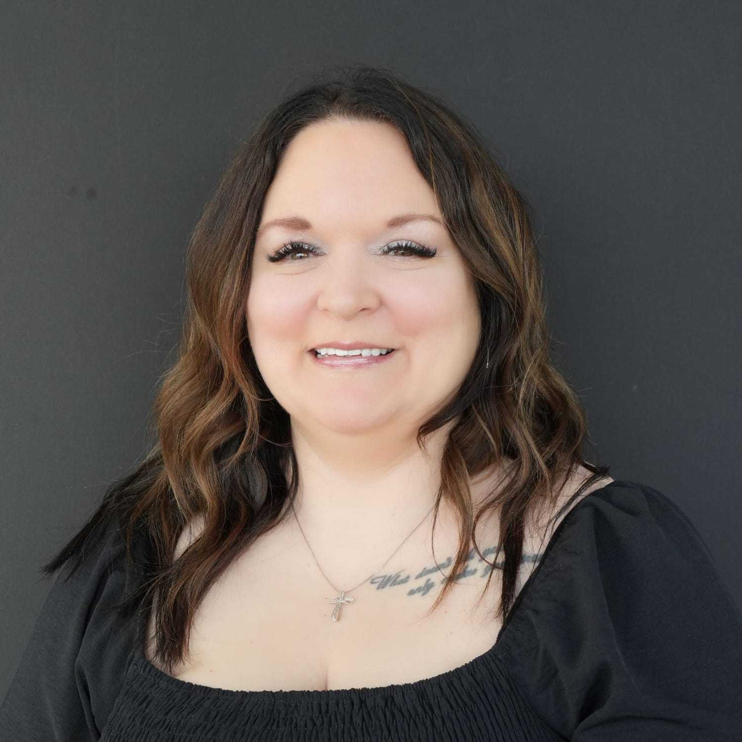 Portrait of Stevi, a professional stylist at Frank Gironda  Salons, showcasing their expertise and style.