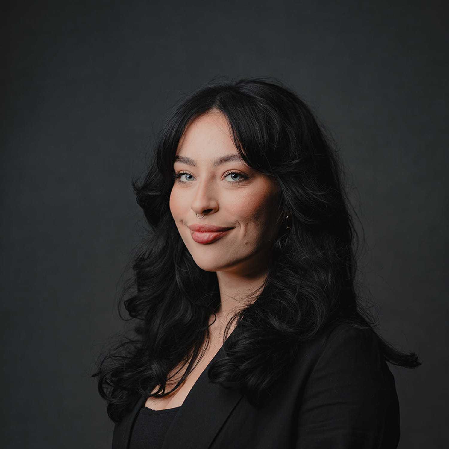 Portrait of Molly, a professional stylist at Frank Gironda  Salons, showcasing their expertise and style.