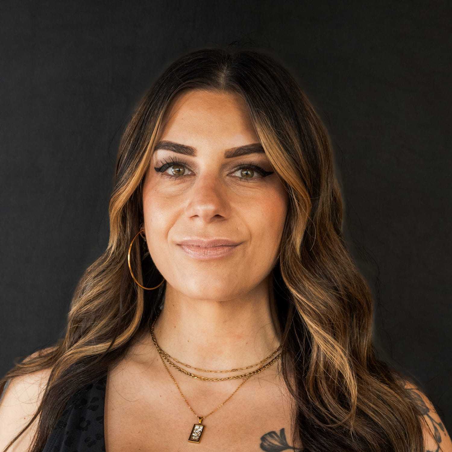 Portrait of Gabrielle, a professional stylist at Frank Gironda Salons, showcasing their expertise and style.