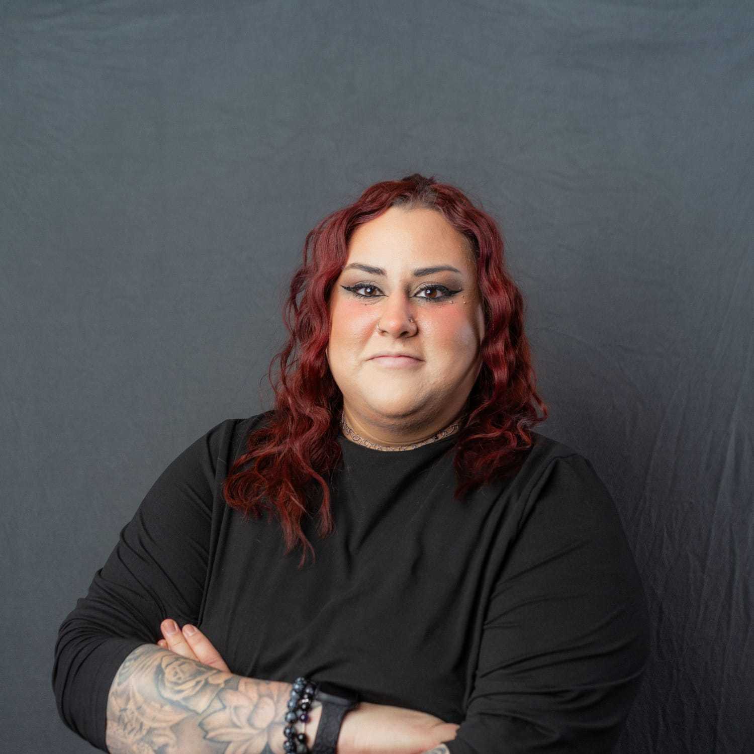 Portrait of Alyssa, a professional stylist at Frank Gironda  Salons, showcasing their expertise and style.