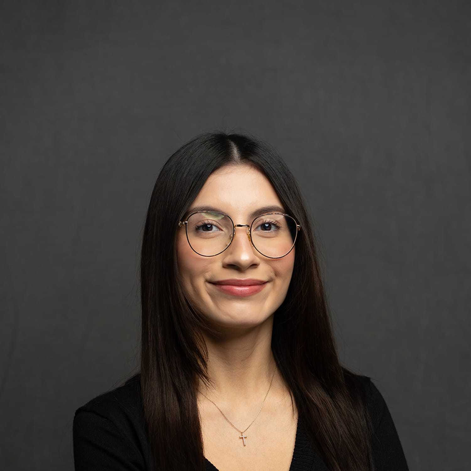 Portrait of Erin, a professional stylist at Frank Gironda  Salons, showcasing their expertise and style.