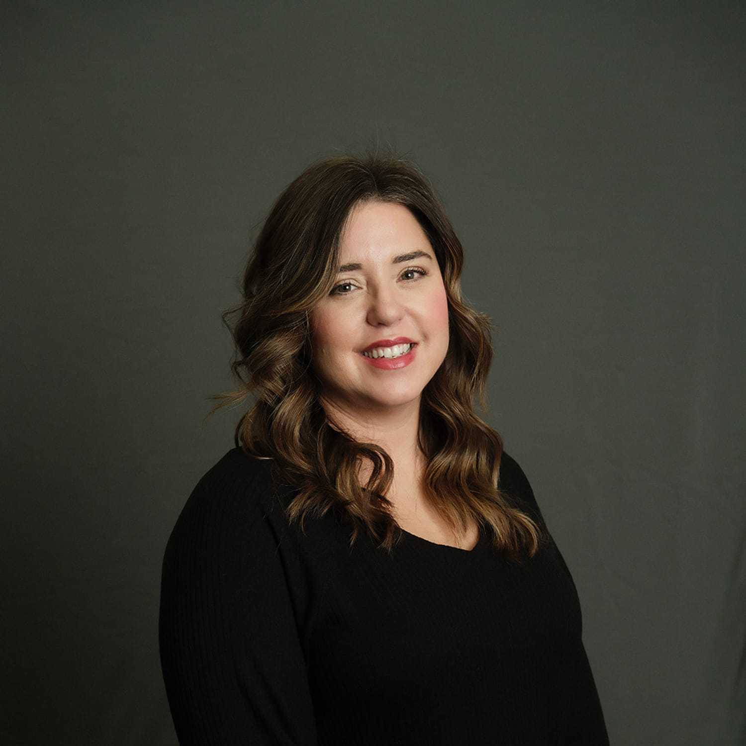 Portrait of Ann, a professional stylist at Frank Gironda  Salons, showcasing their expertise and style.