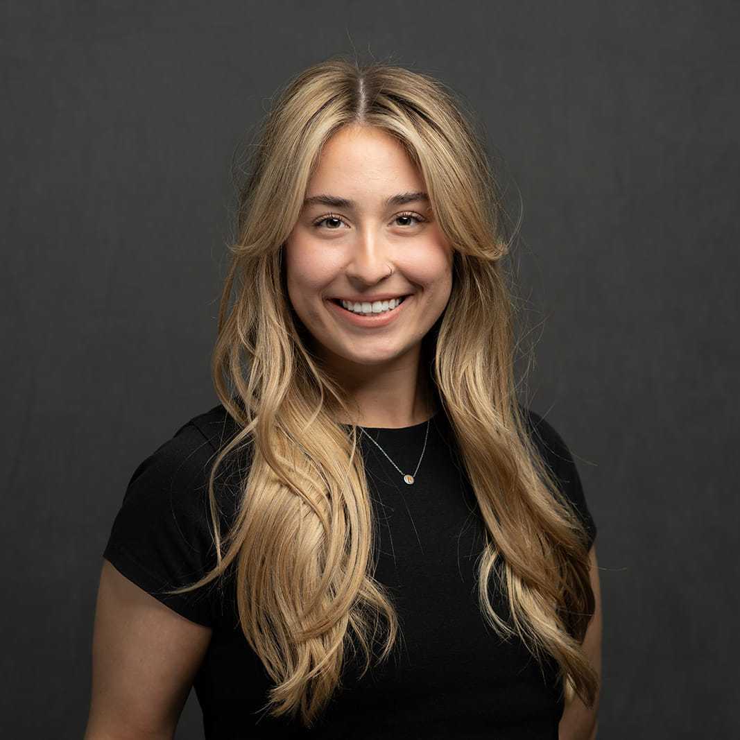 Portrait of Natalie, a professional stylist at Frank Gironda Salons, showcasing their expertise and style.
