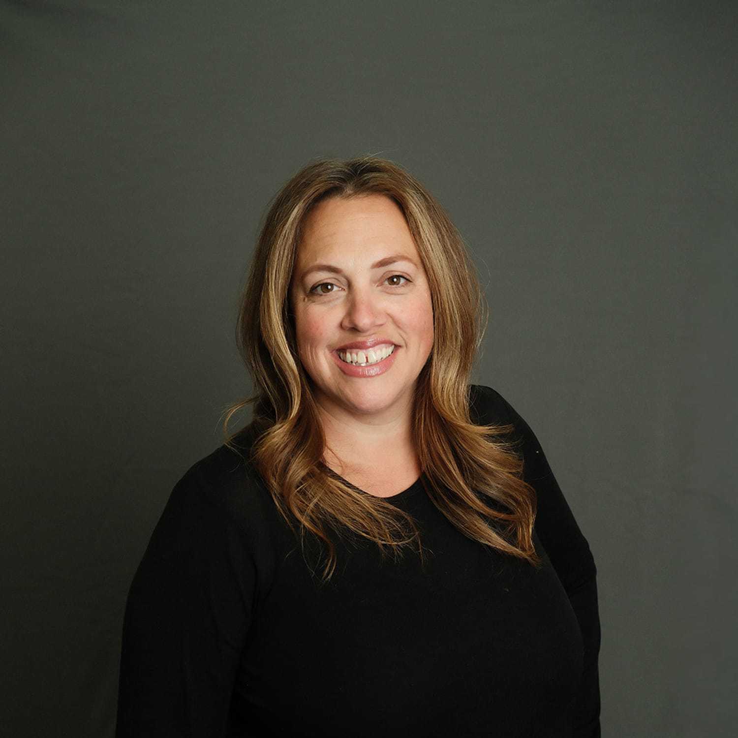 Portrait of Valerie, a professional stylist at Frank Gironda  Salons, showcasing their expertise and style.