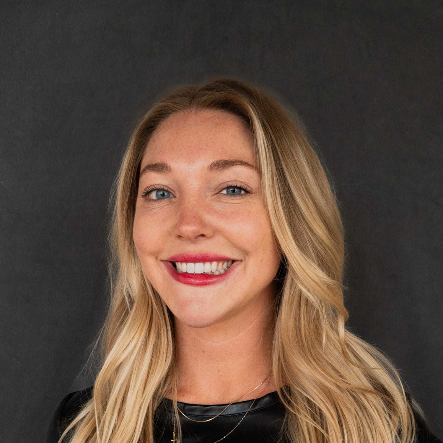 Portrait of Kylie, a professional stylist at Frank Gironda  Salons, showcasing their expertise and style.