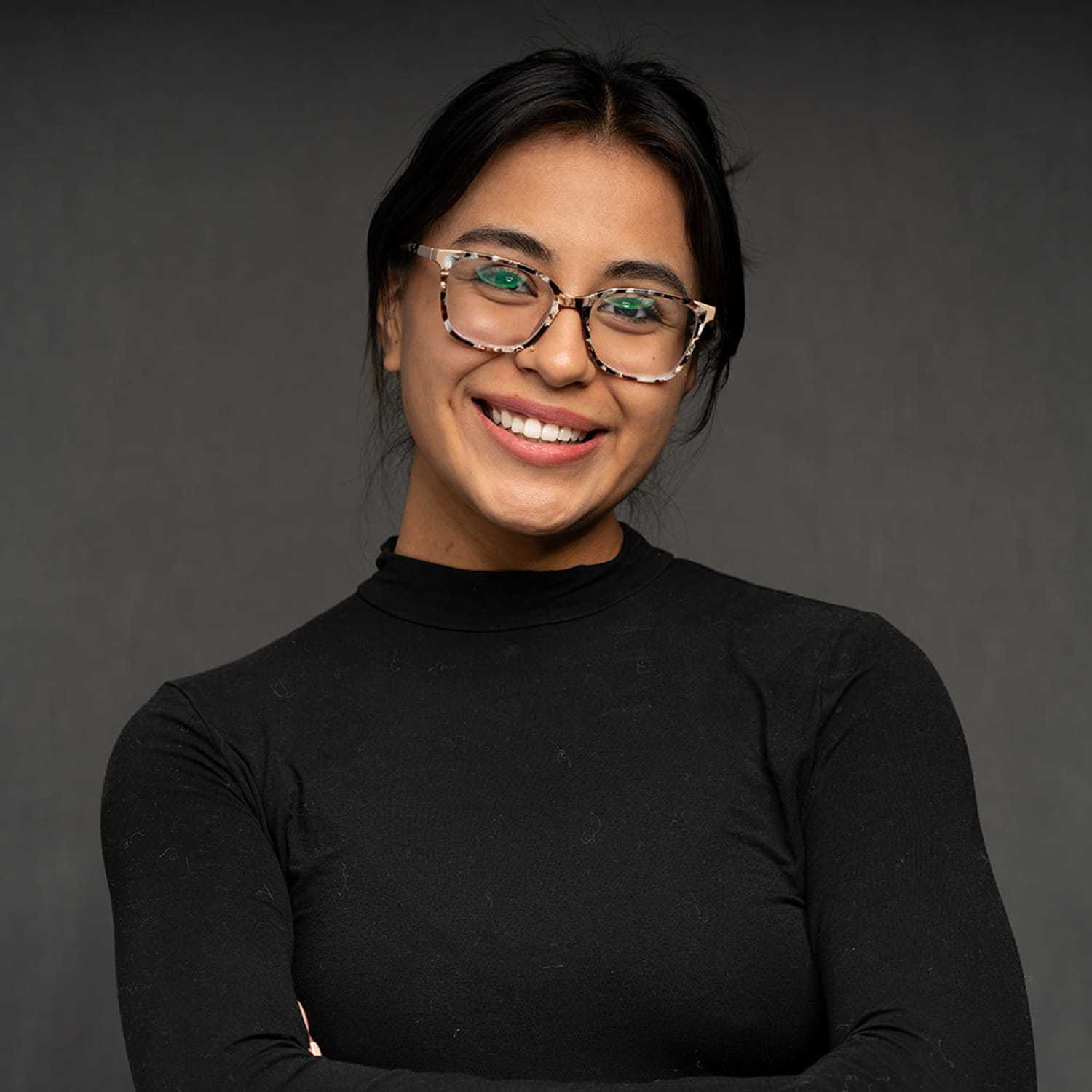 Portrait of Sophie, a professional stylist at Frank Gironda  Salons, showcasing their expertise and style.