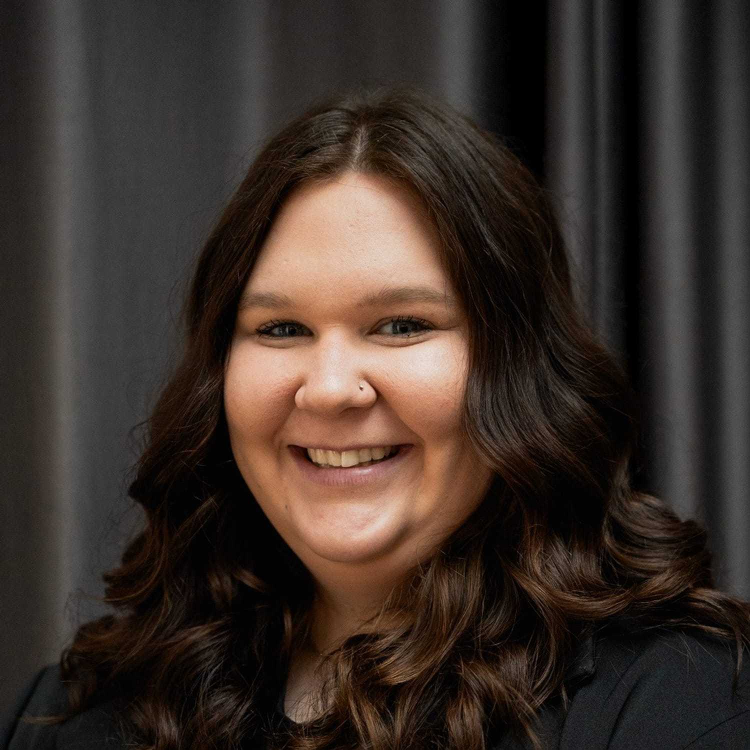 Portrait of Kaylee, a professional stylist at Frank Gironda  Salons, showcasing their expertise and style.