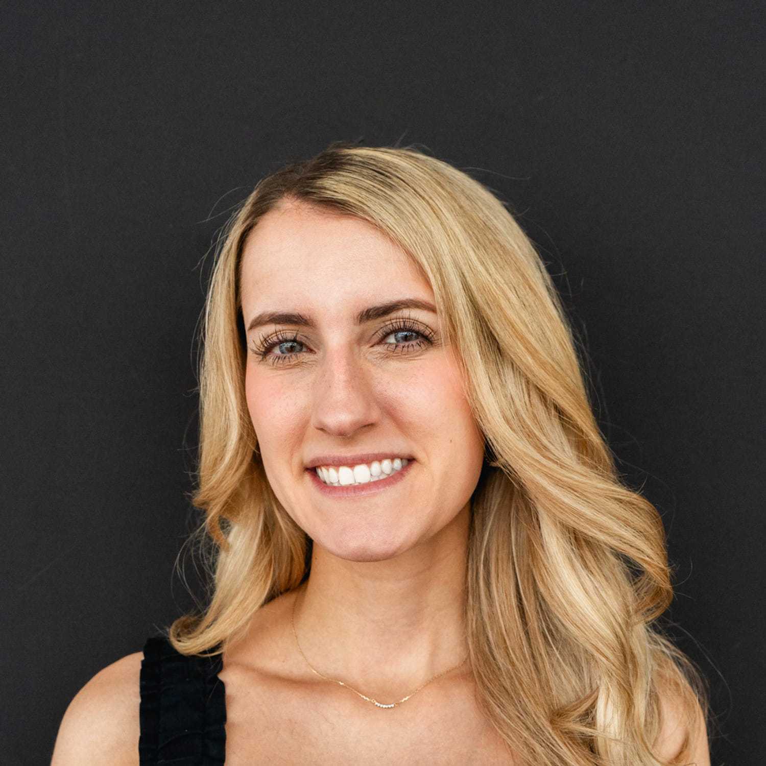 Portrait of Jessie, a professional stylist at Frank Gironda  Salons, showcasing their expertise and style.