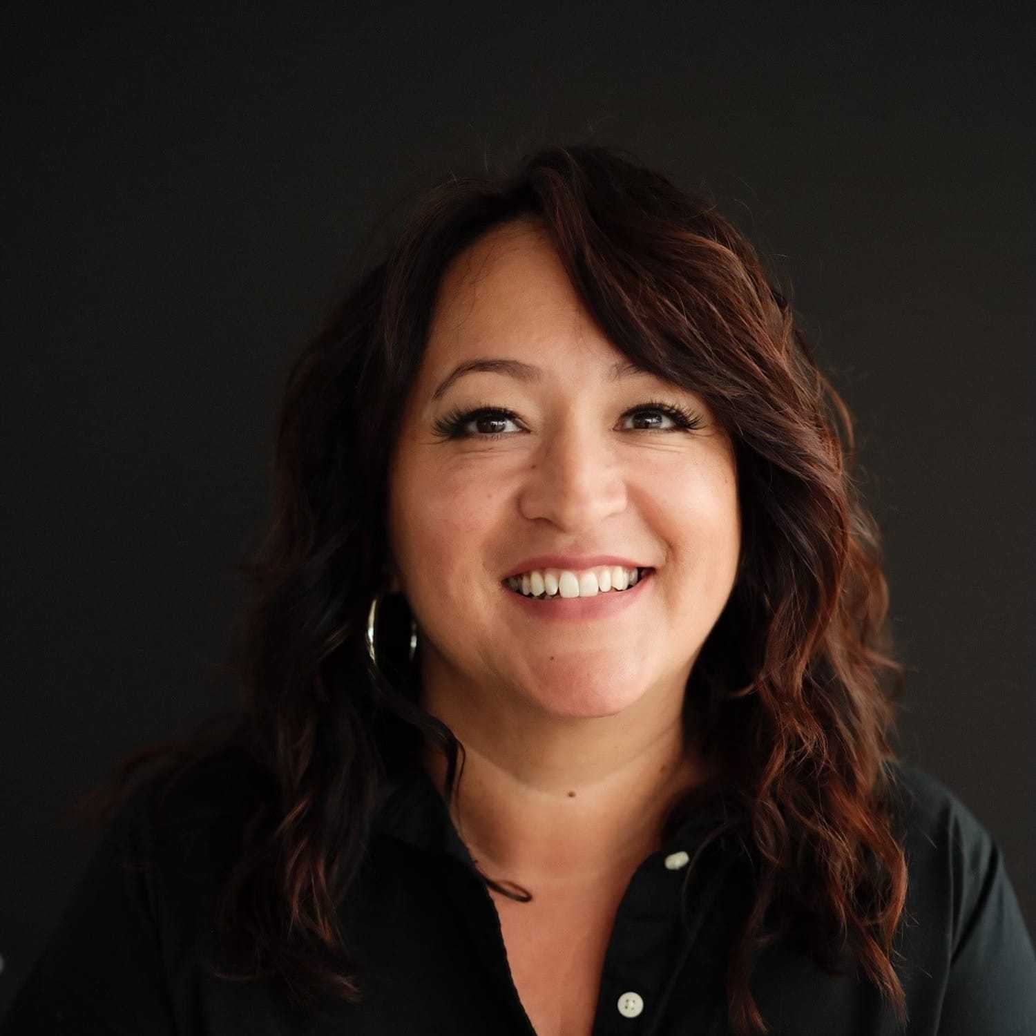 Portrait of Ceci, a professional stylist at Frank Gironda  Salons, showcasing their expertise and style.