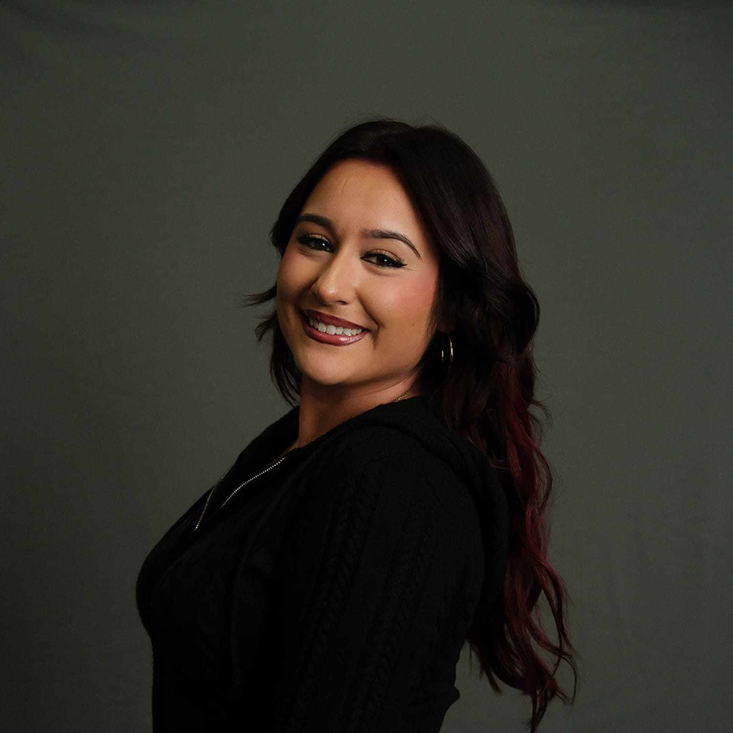 Portrait of Diosa, a professional stylist at Frank Gironda  Salons, showcasing their expertise and style.