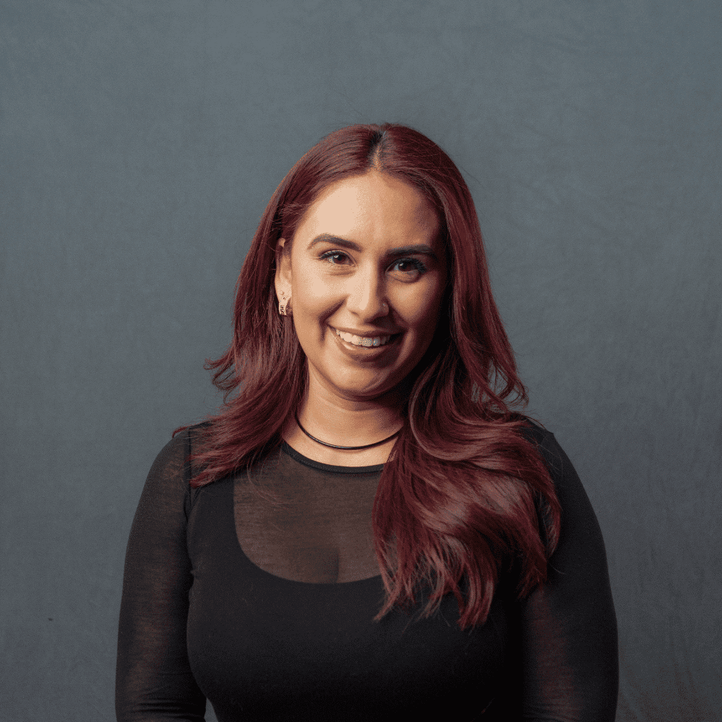 Portrait of Justine, a professional stylist at Frank Gironda  Salons, showcasing their expertise and style.