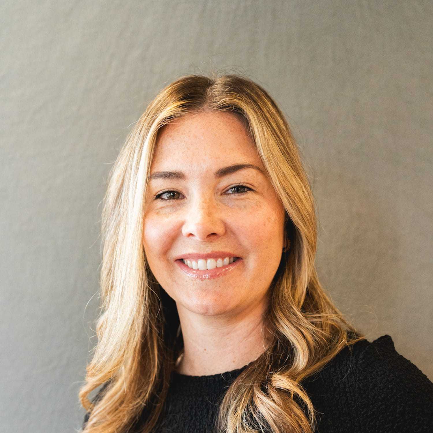 Portrait of Kelsey, a professional stylist at Frank Gironda Salons, showcasing their expertise and style.