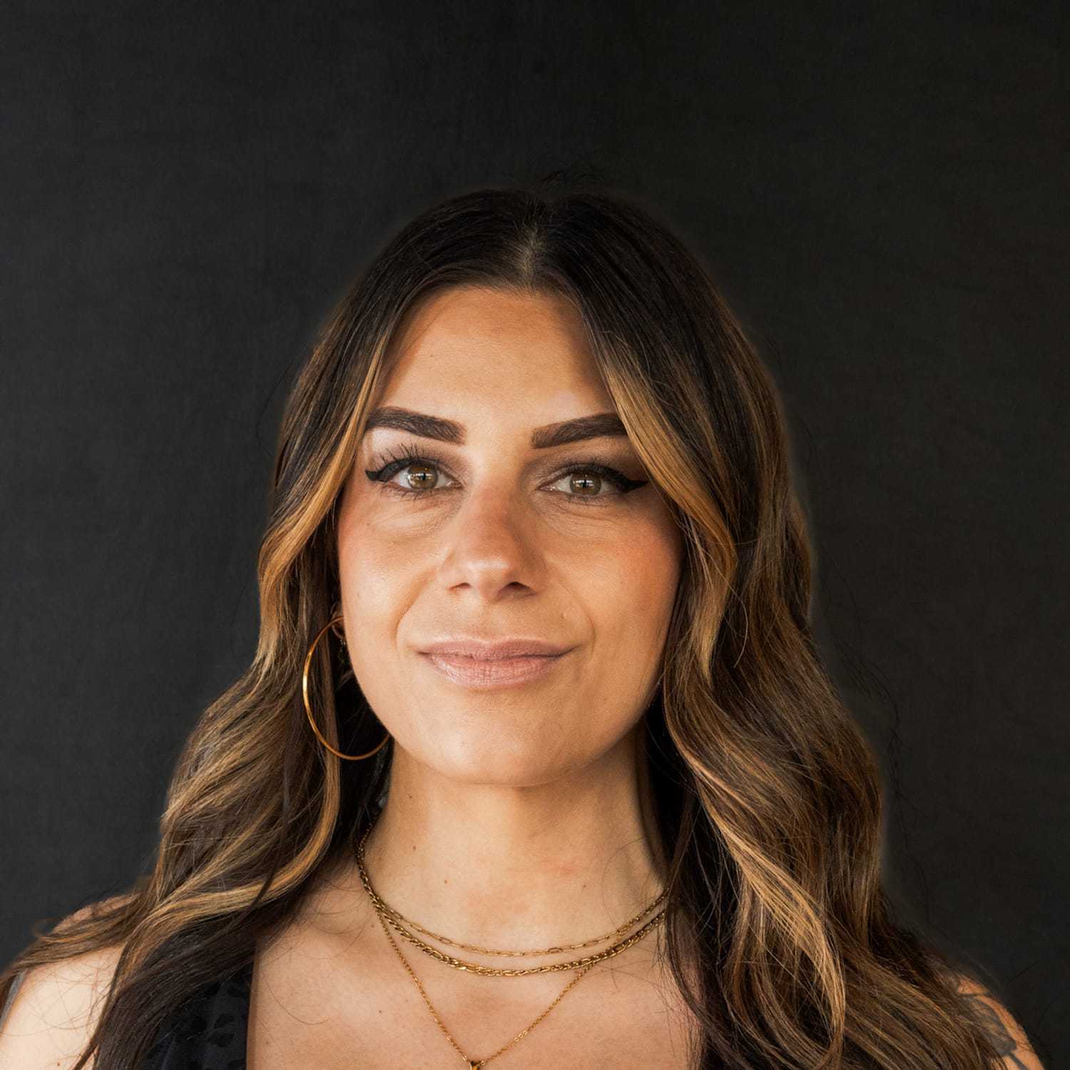 Portrait of Gabrielle, a professional stylist at Frank Gironda  Salons, showcasing their expertise and style.