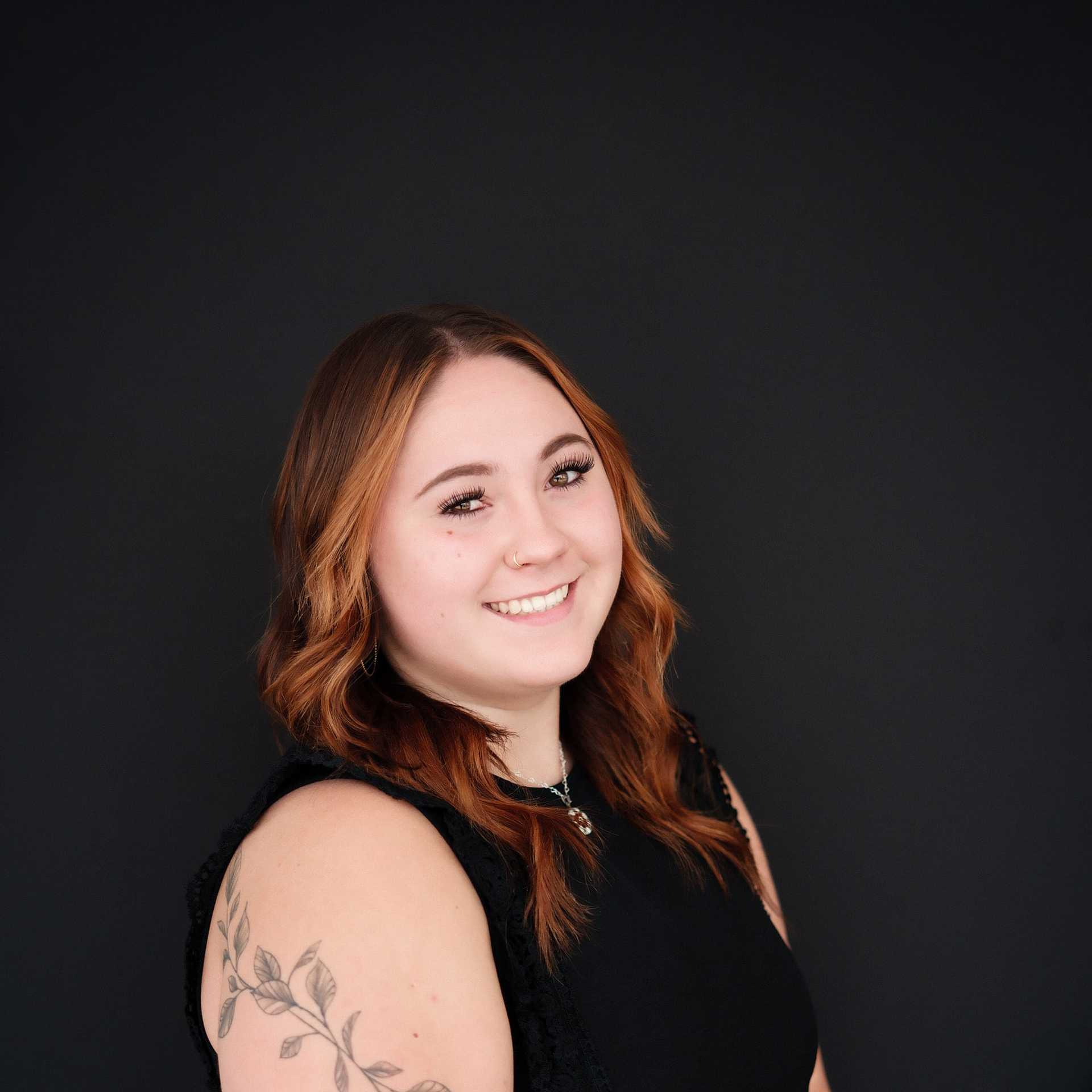 Portrait of Tara, a professional stylist at Frank Gironda Salons, showcasing their expertise and style.