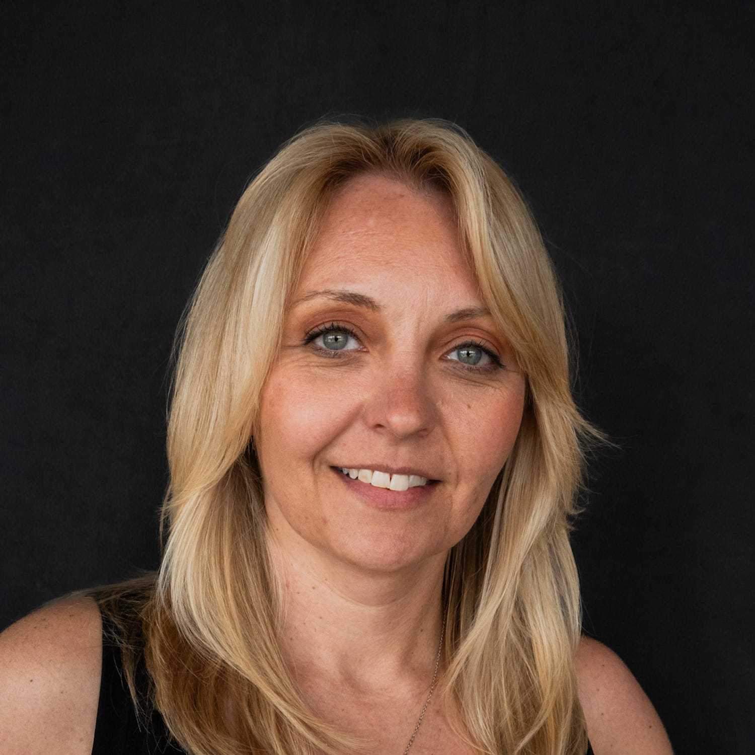 Portrait of Arianna, a professional stylist at Frank Gironda  Salons, showcasing their expertise and style.