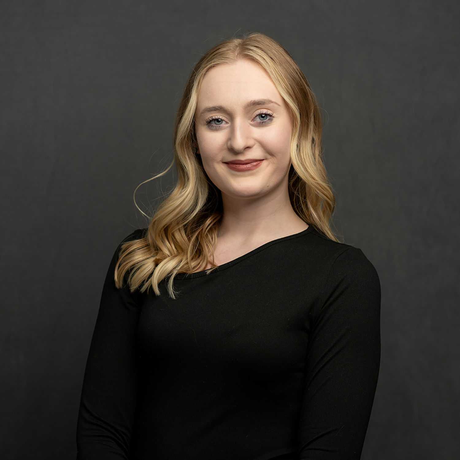 Portrait of Sydney, a professional stylist at Frank Gironda  Salons, showcasing their expertise and style.